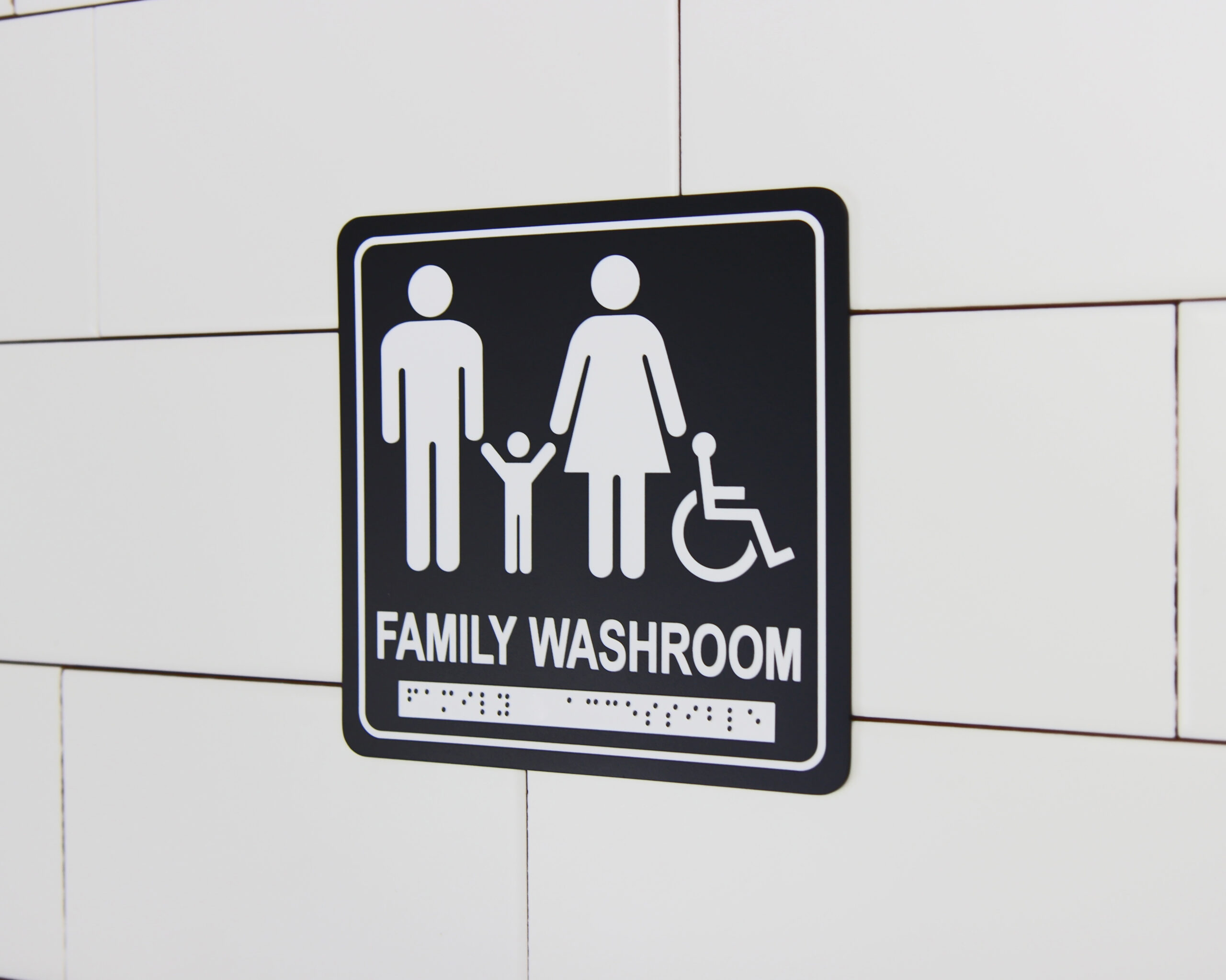 Frost code 959-BLK Family and Accessible Washroom Sign In Use 2 for Web