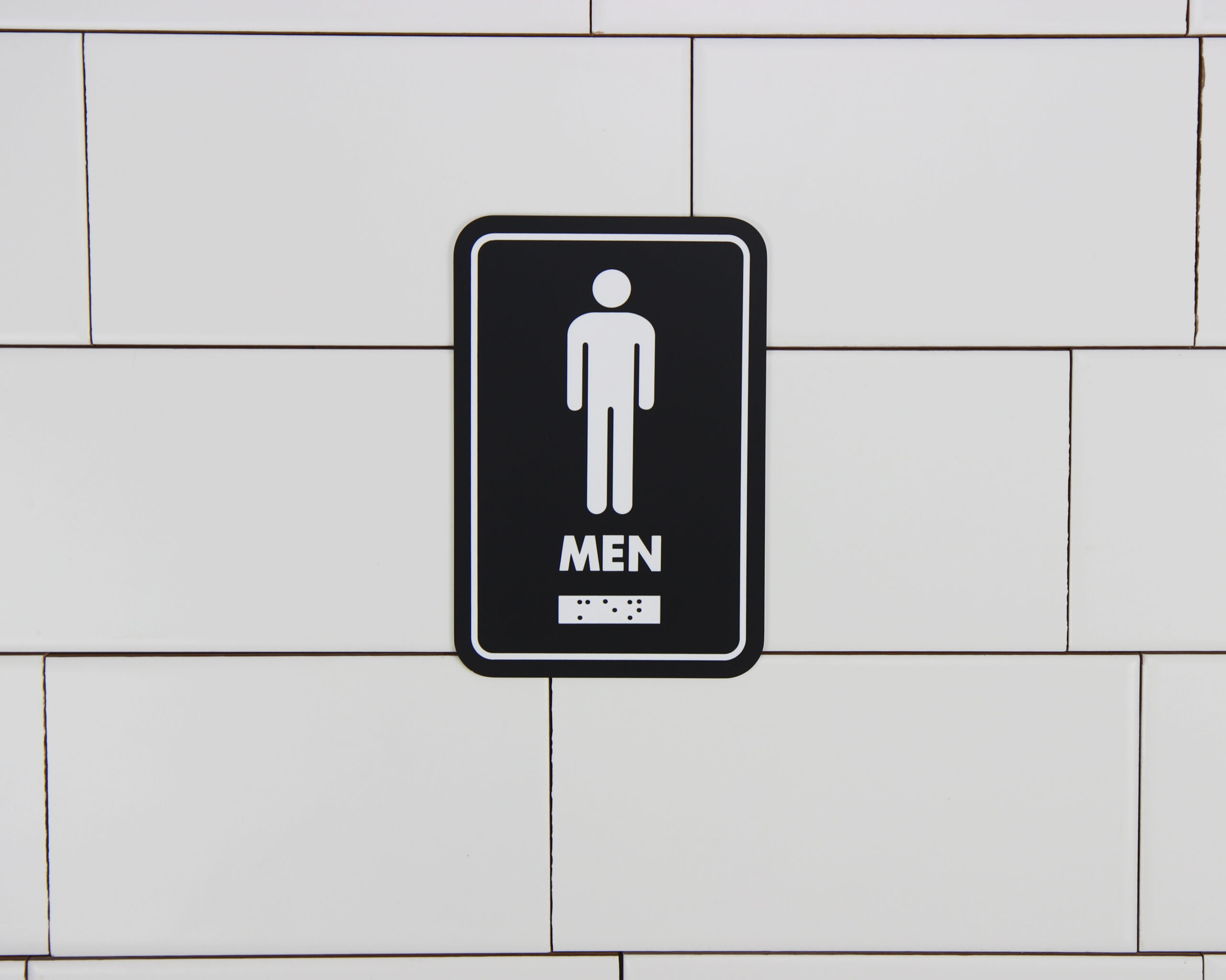 Frost code 960-BLK Male Washroom Sign In Use